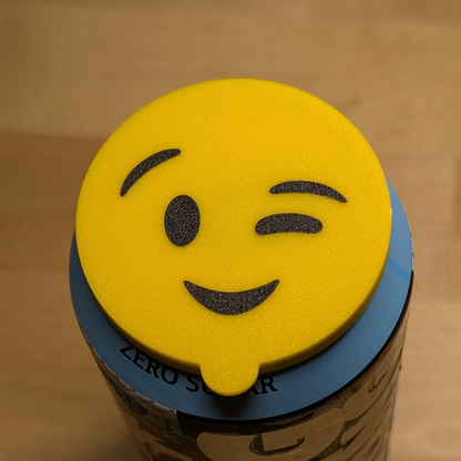 "Wink emoji" Tölkin kansi
